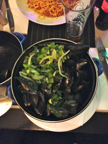 Tasting Belgian mussels. Photo Credit: Allie Hanson 