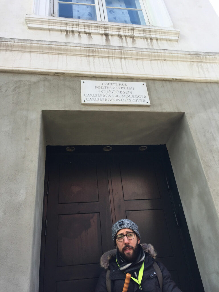 Simon, my tour guide on a walking tour in Copenhagen, showing us the house where the famous Danish beer brewer J.C. Jacobsen was born.